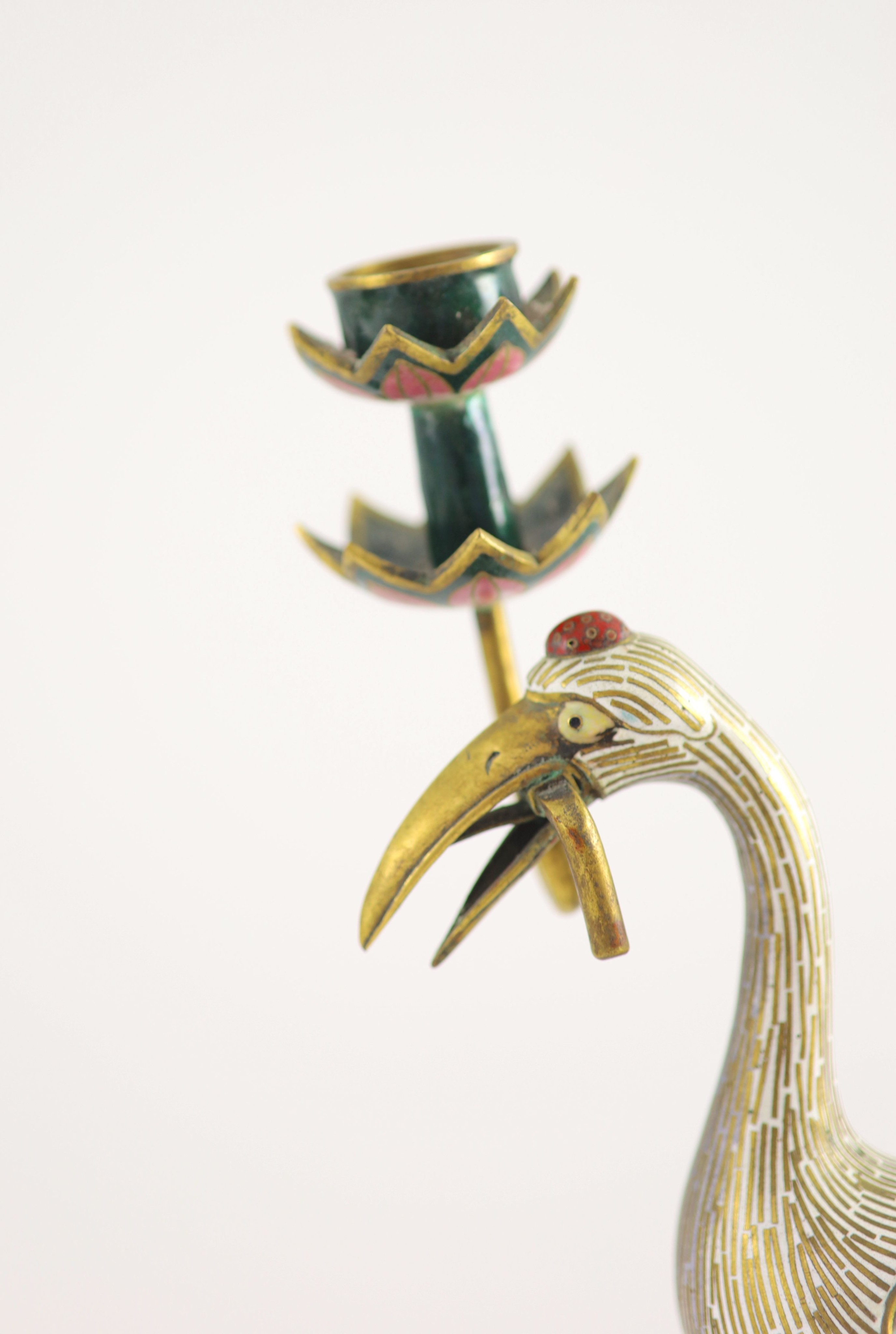 A pair of Chinese cloisonné enamel and gilt bronze ’crane’ candlesticks, early 20th century, 38cm high